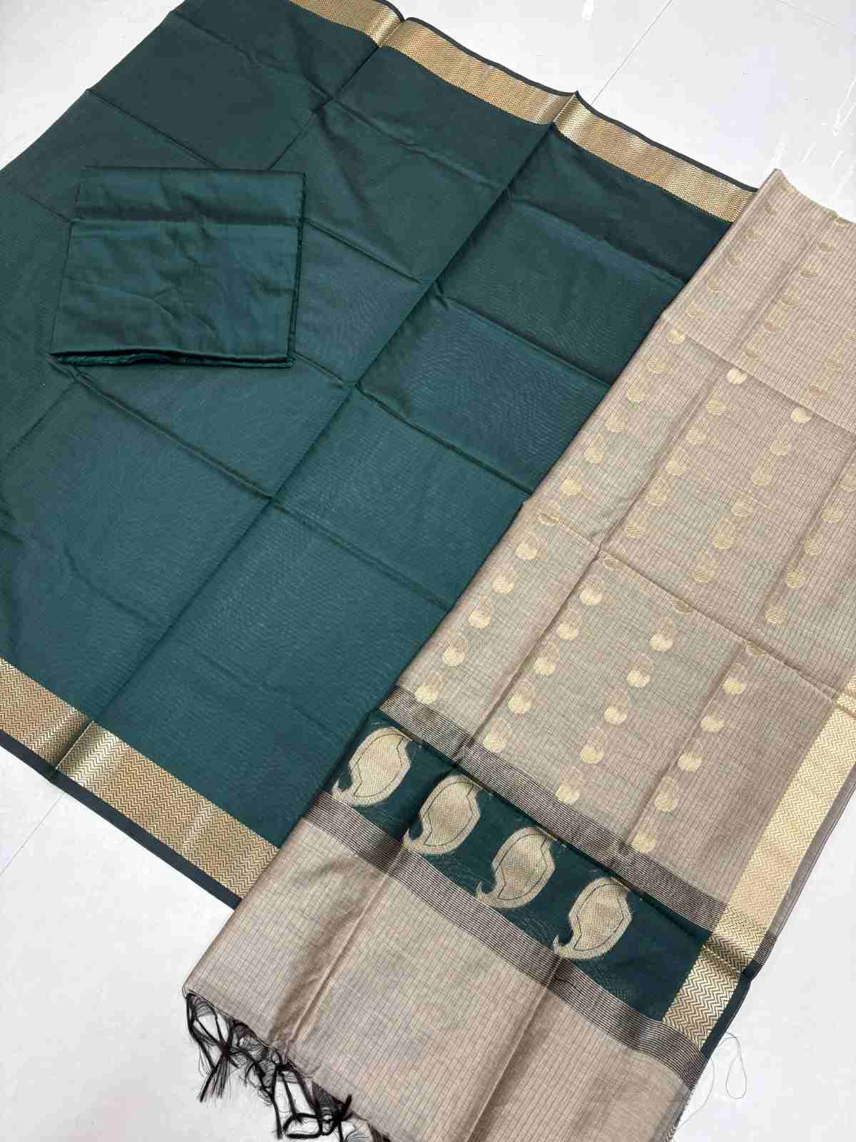 Dark peacock green with light cement 